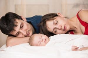 Tired Mom & Dad with Newborn
